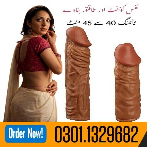 A Condom On The Head Of The Erect, Hard Penis. If Uncircumcised, Pull Back The Foreskin First.